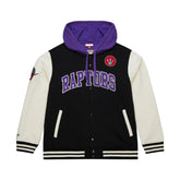 Black and white jacket with purple hood and 'Raptors' text on a white background