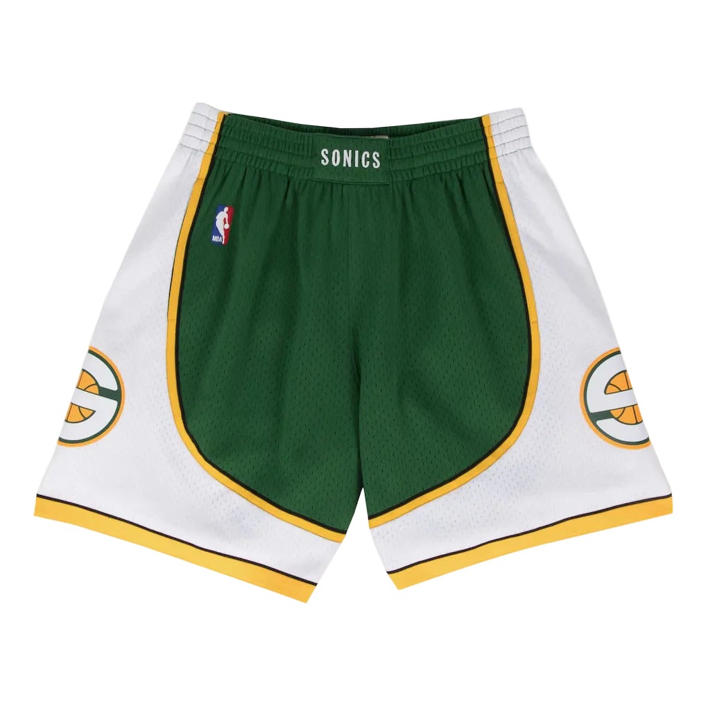 Green and white basketball shorts with Sonics logo on a white background