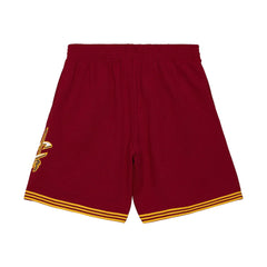 Maroon shorts with gold accents on a white background