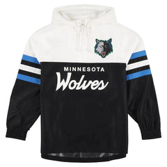 A Minnesota Wolves pullover jacket with a white hooded upper section, black lower body, blue and white sleeve stripes, and a wolf logo on the chest.